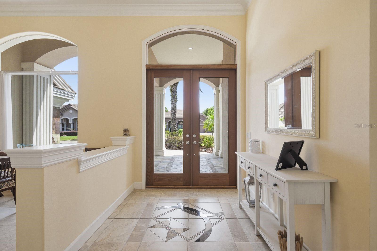 Elegant double glass entry doors, 28-home gated enclave · 976 Cypress Cove Way Tarpon Springs FL 34688