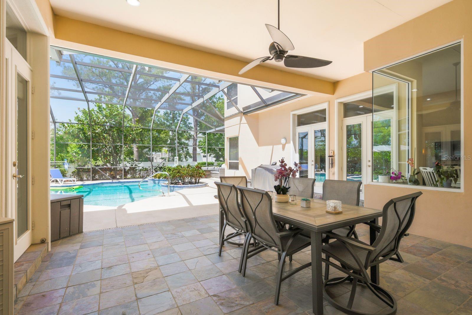 Covered lanai, seamless indoor-outdoor living · 976 Cypress Cove Way Tarpon Springs FL 34688