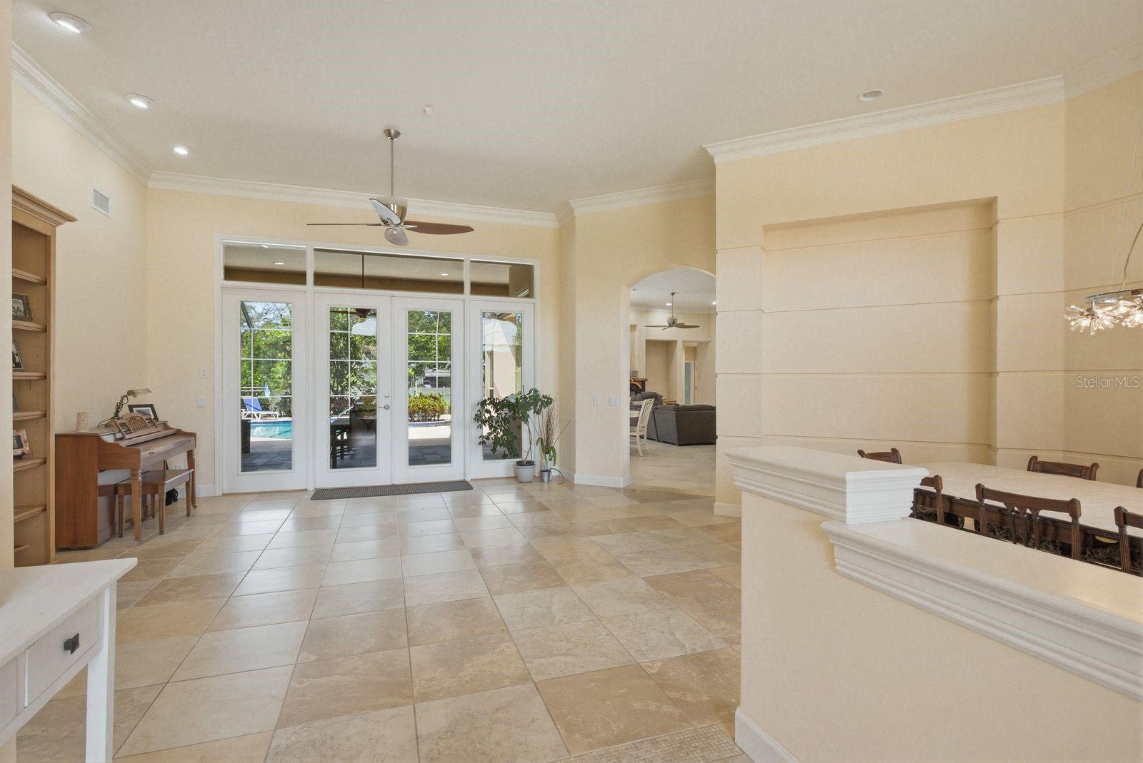 Living Room with View of Lanai and Pool · 976 Cypress Cove Way Tarpon Springs FL 34688