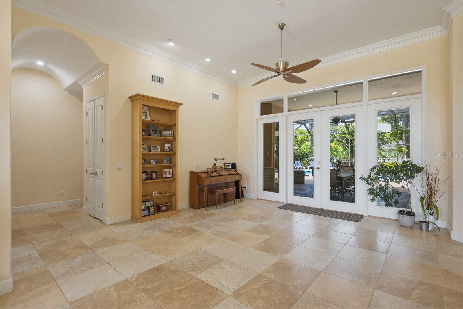 Living Room with View of Lanai and Pool · 976 Cypress Cove Way Tarpon Springs FL 34688