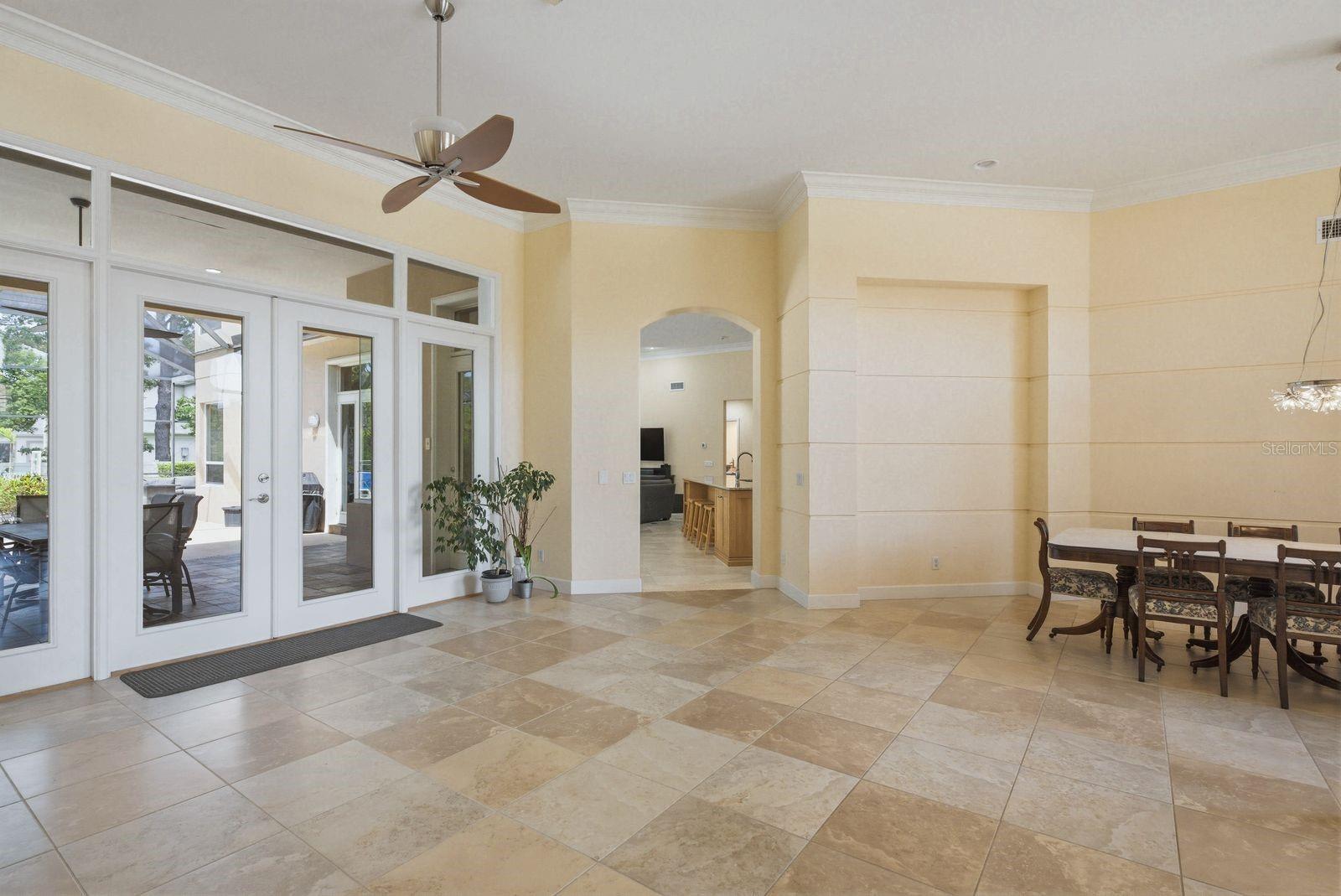 Living/Dining Room Room with View of Lanai and Pool · 976 Cypress Cove Way Tarpon Springs FL 34688