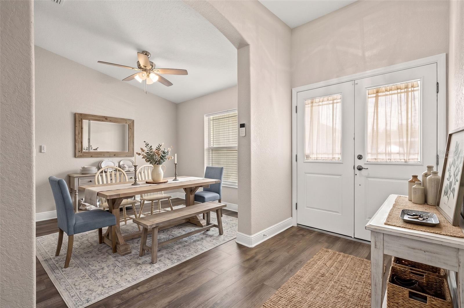 Virtually Staged Dining Room and foyer