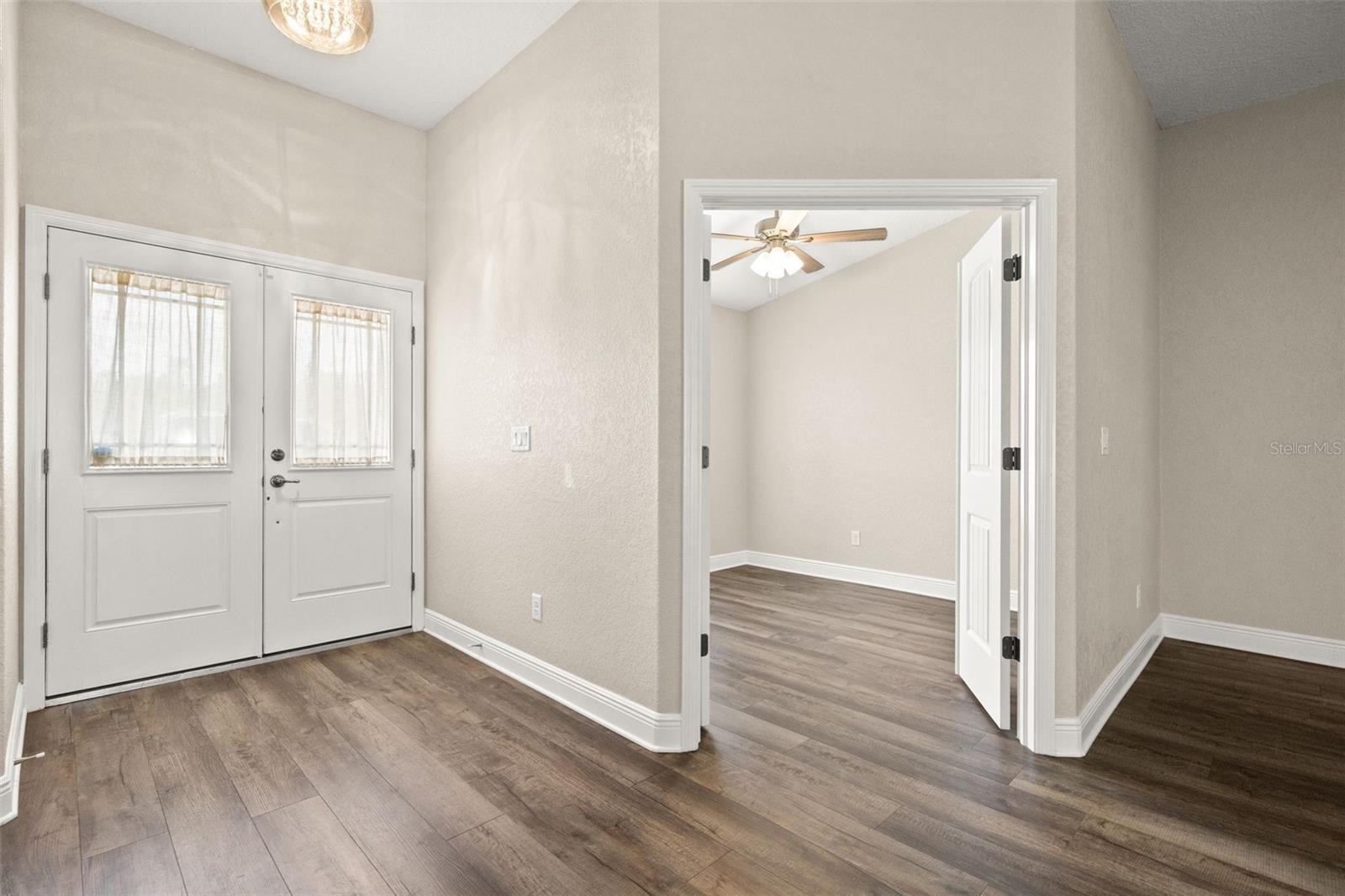 Double front doors to main home and office  view Main Home