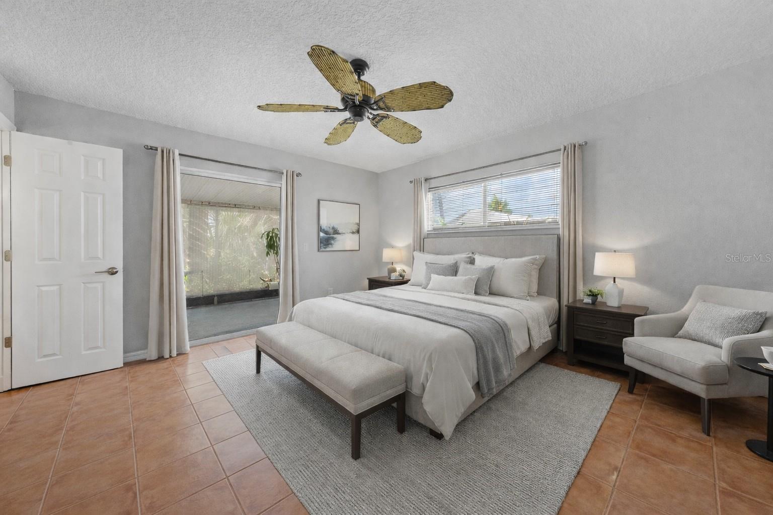 MASTER BEDROOM with slider access to the POOL