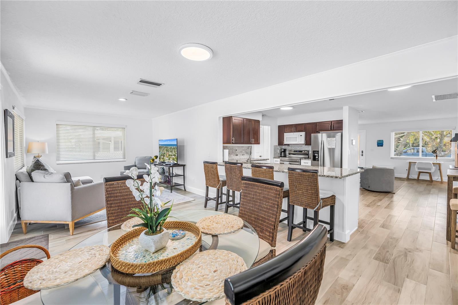 Open layout dining, kitchen family and living room