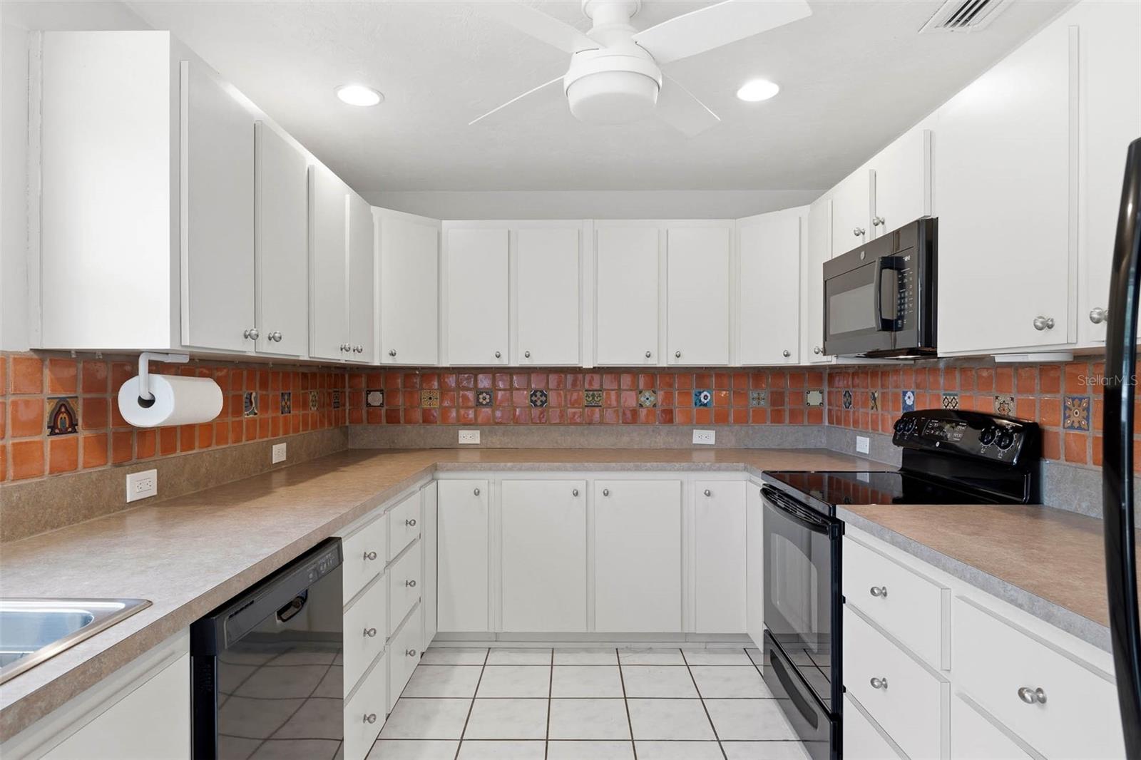 Kitchen offering tons of storage