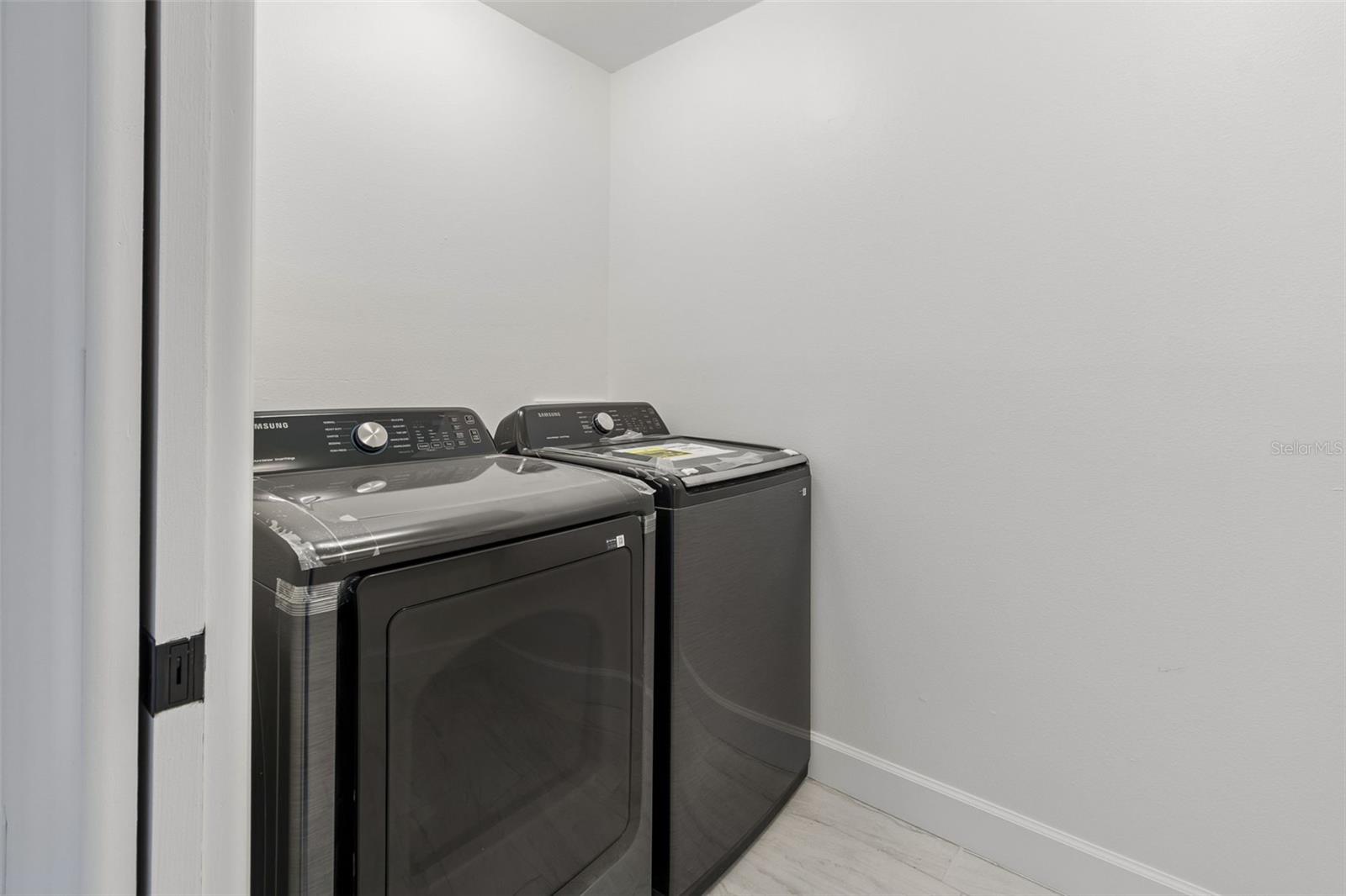 Laundry room With Brand New Washer & Dryer