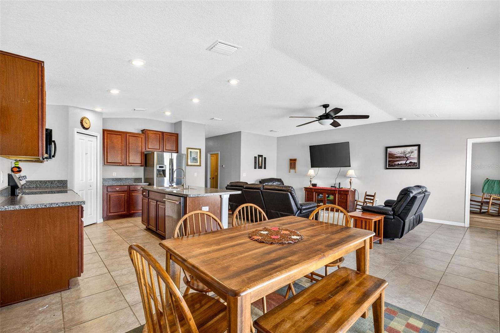 Dining room, kitchen and living areas