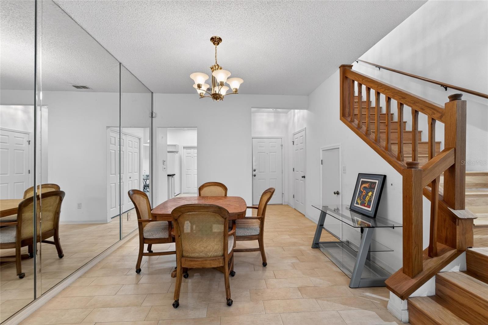 Formal Dinning towards upstairs and kitchen