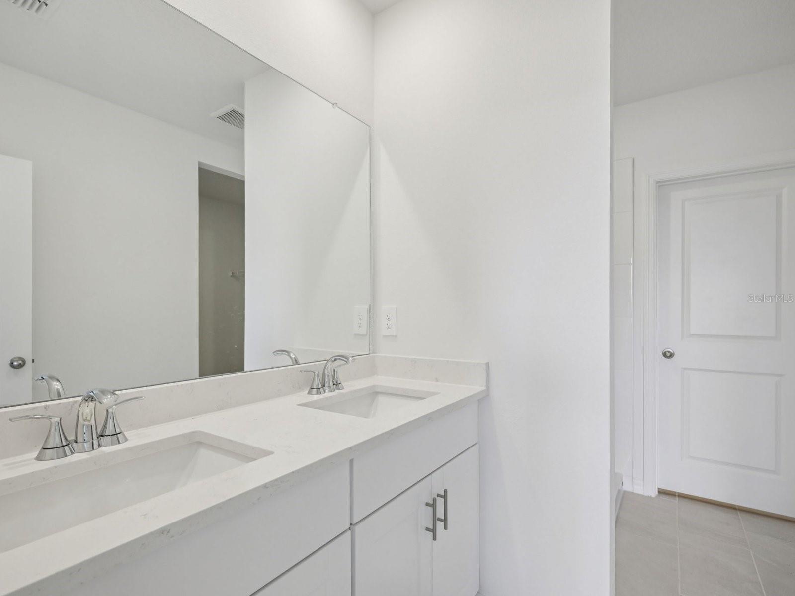 Interior photos are not of the actual home but are photos of the builder home with the same floorplan with similar interior finishes and features.