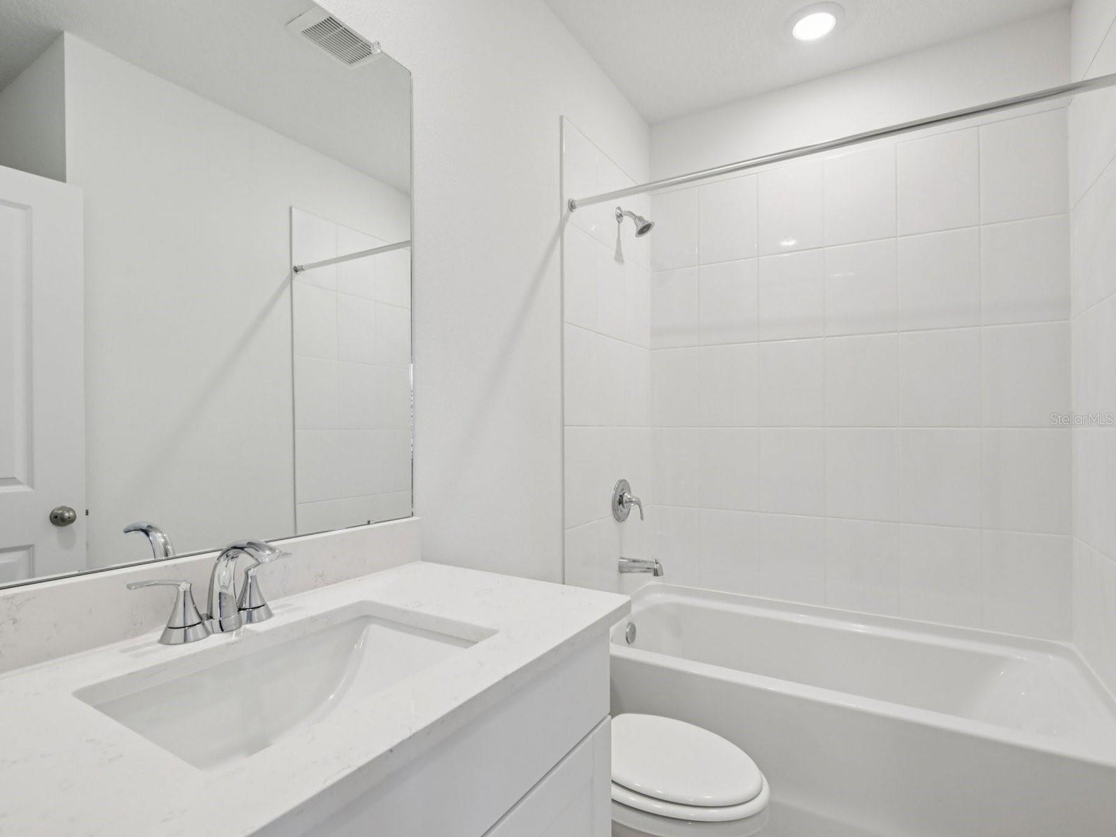 Interior photos are not of the actual home but are photos of the builder home with the same floorplan with similar interior finishes and features.