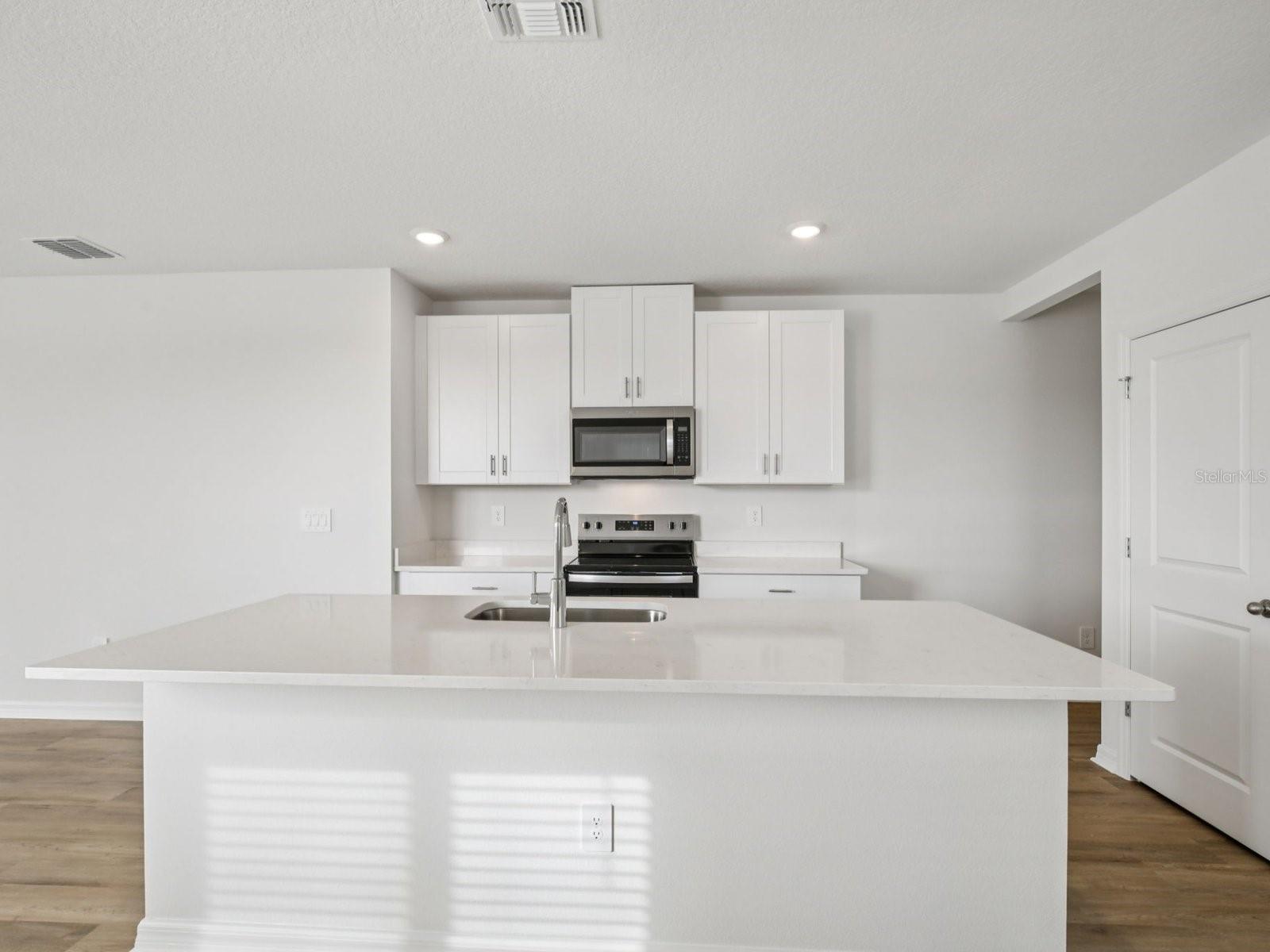 Interior photos are not of the actual home but are photos of the builder home with the same floorplan with similar interior finishes and features.