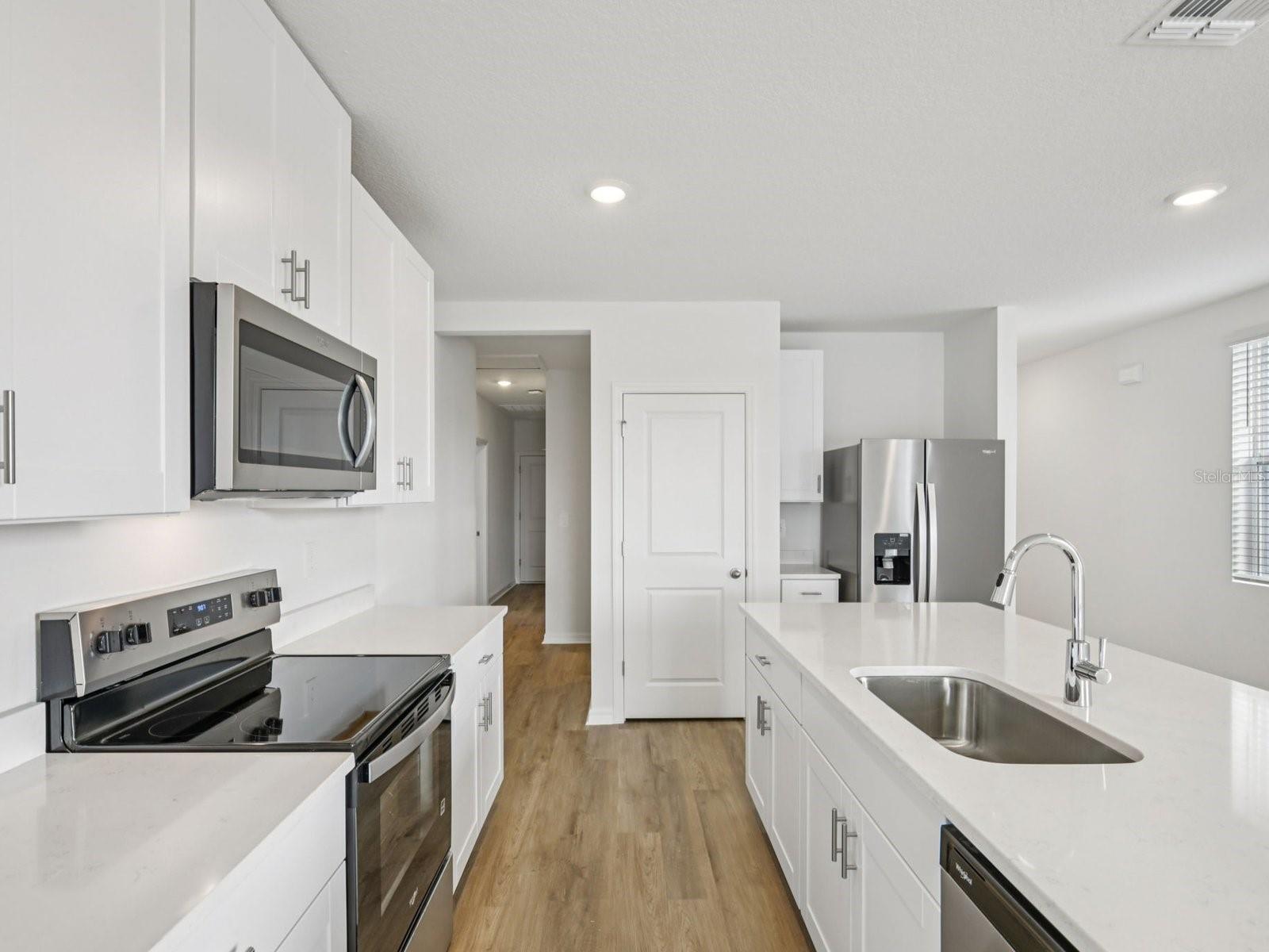 Interior photos are not of the actual home but are photos of the builder home with the same floorplan with similar interior finishes and features.