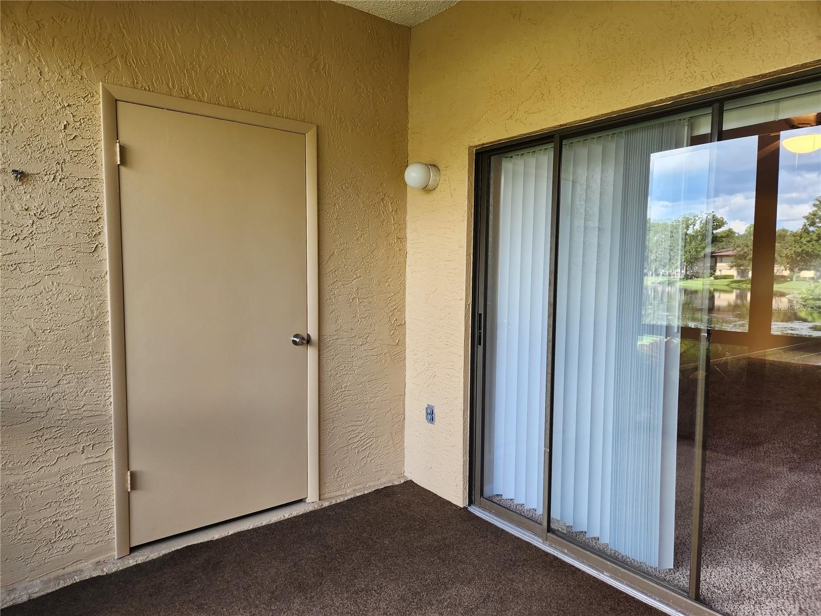 Storage room on porch.
