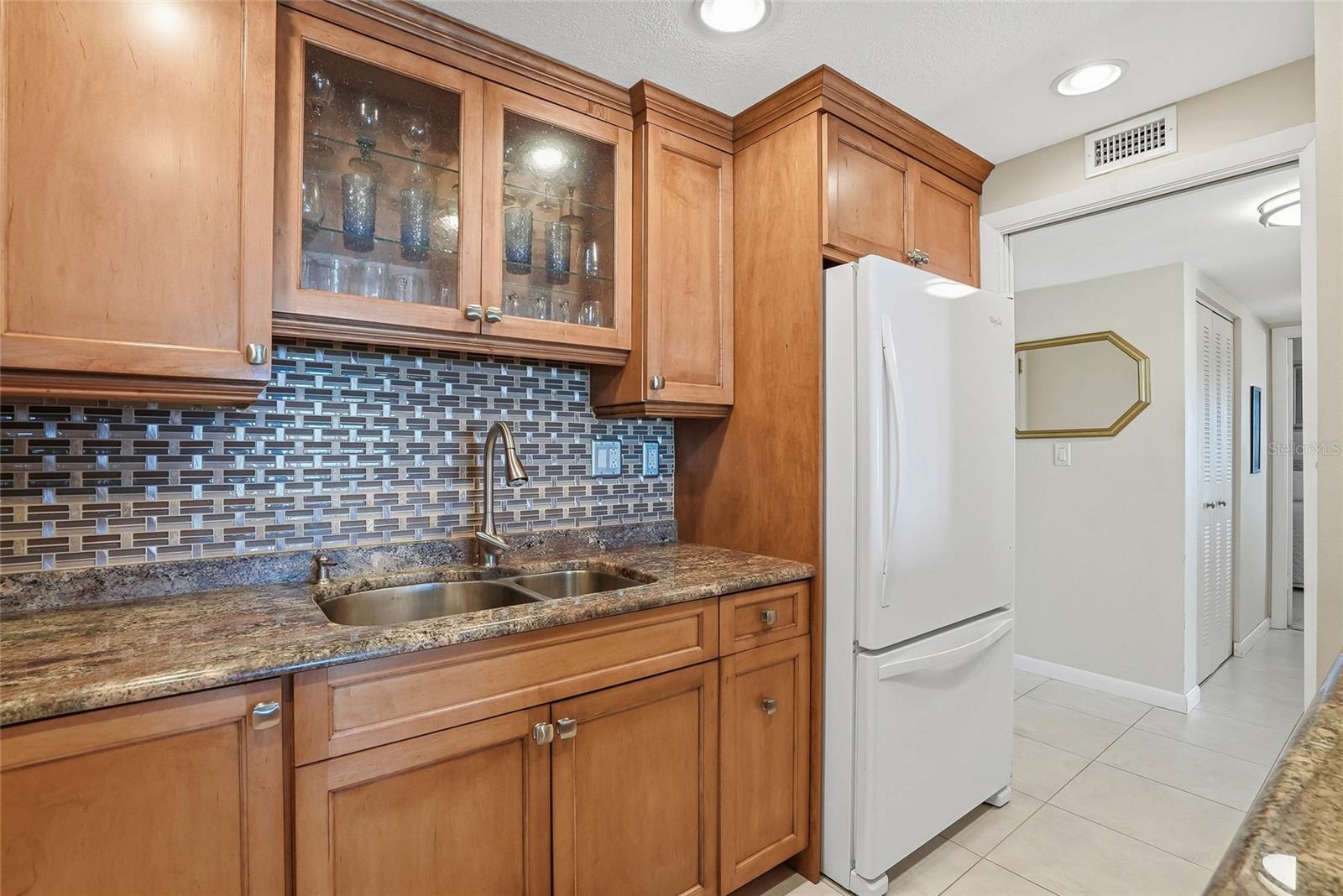 Custom cabinetry and granite counters.