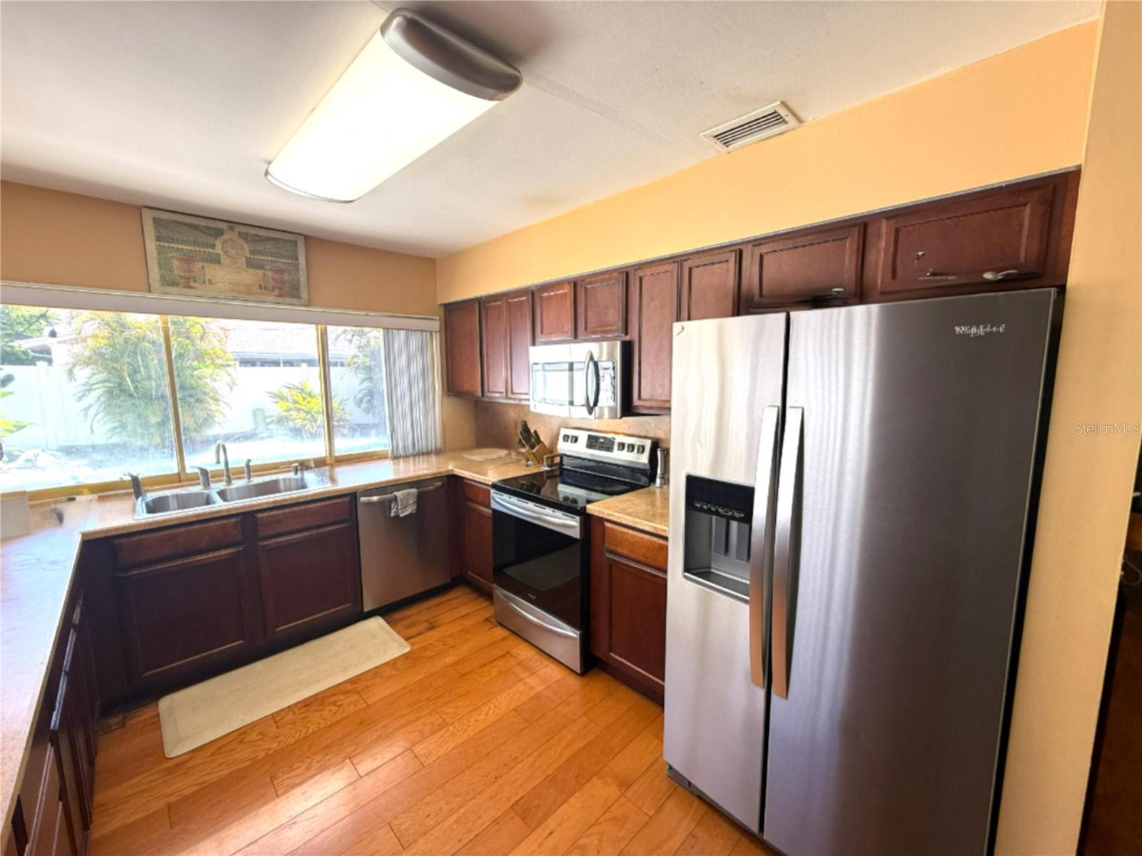 Kitchen with pass through windows