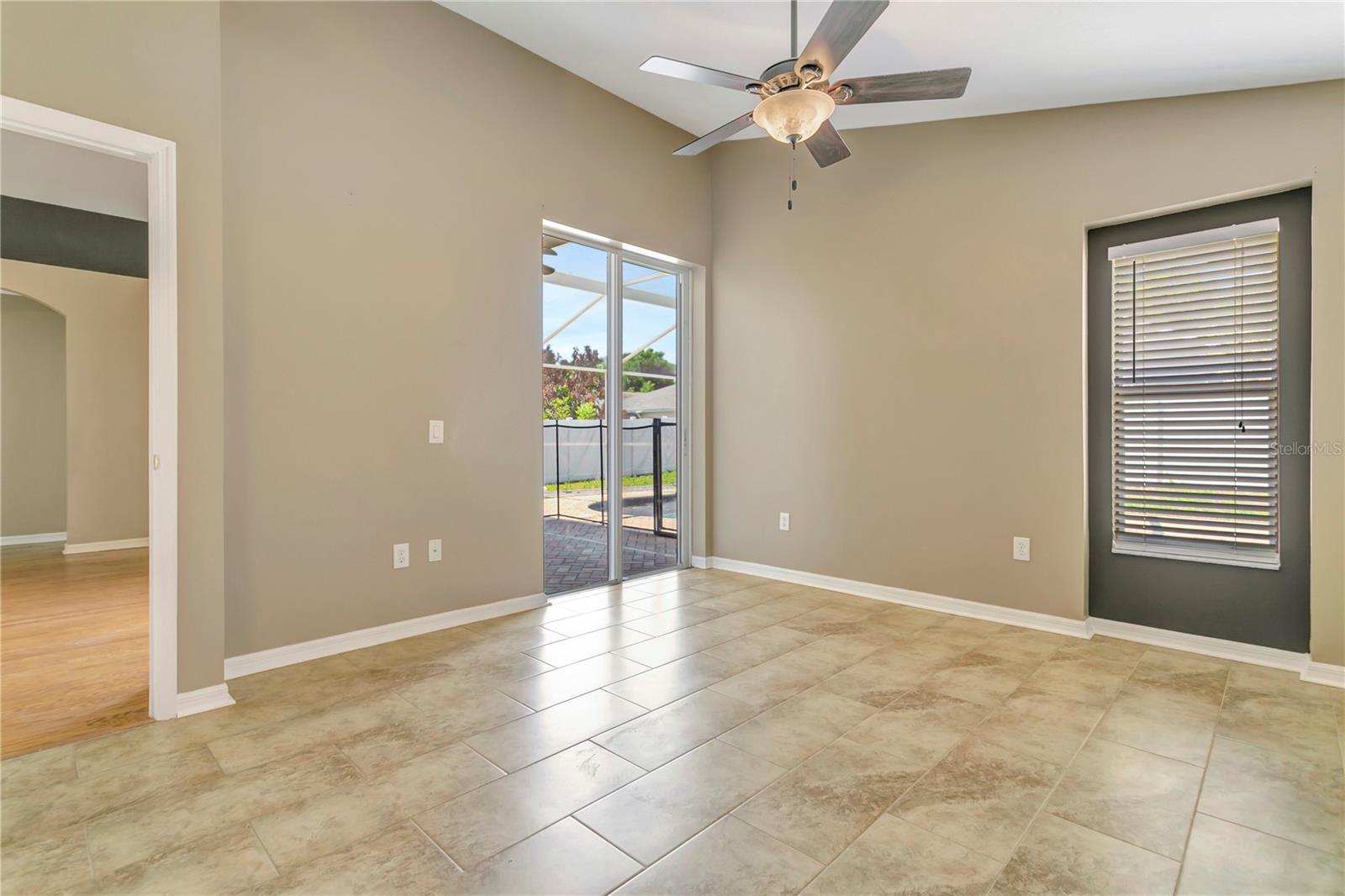 Primary Bedroom - Doors out to Pool