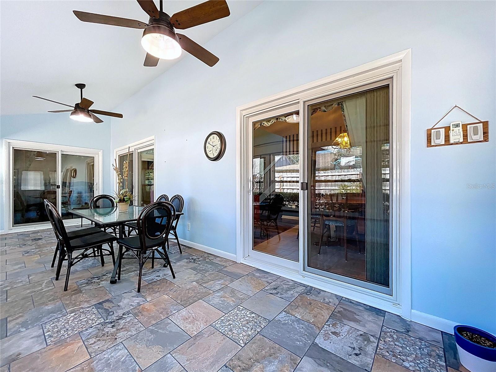 Three sets of sliding glass doors