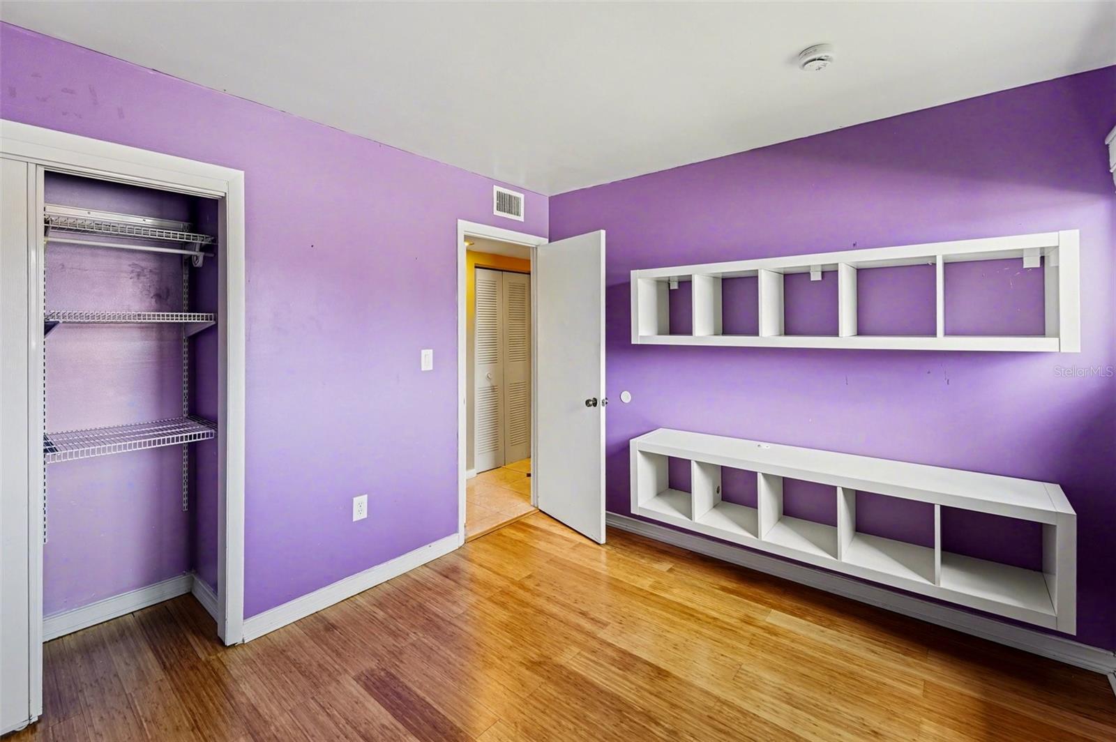 Bedroom 3 (High window, mounted shelving)
