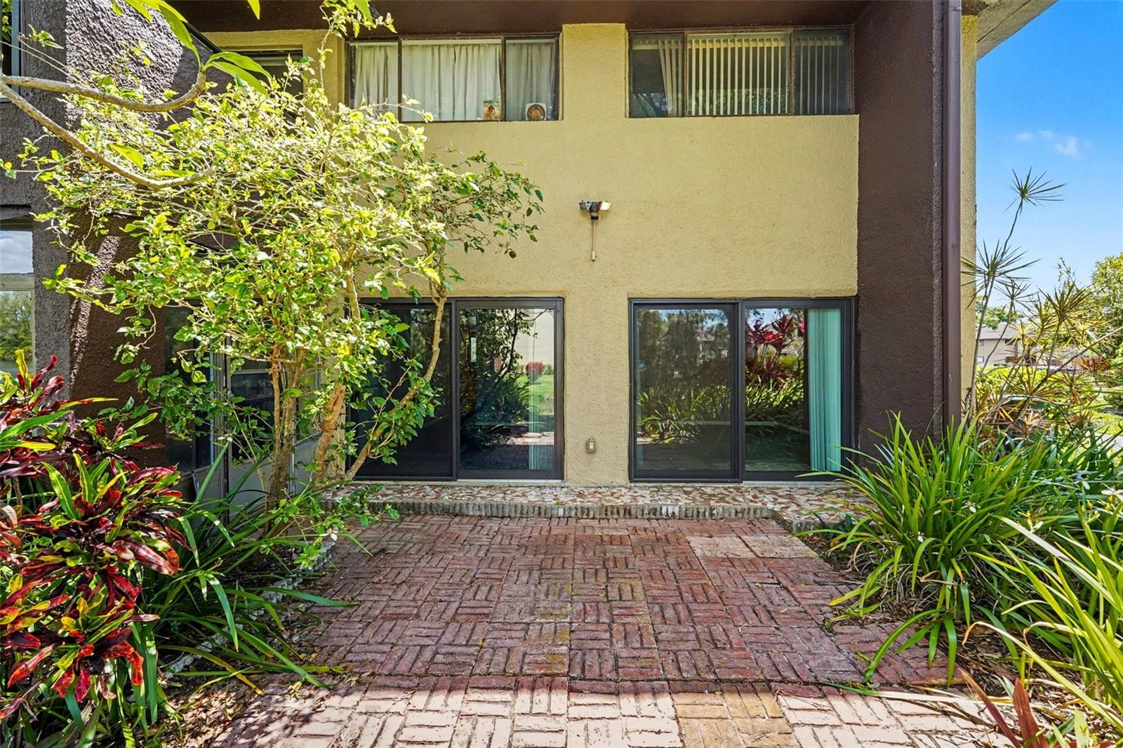 Back outdoor patio (Access to Bedroom 2 and Master Bedroom shown here)