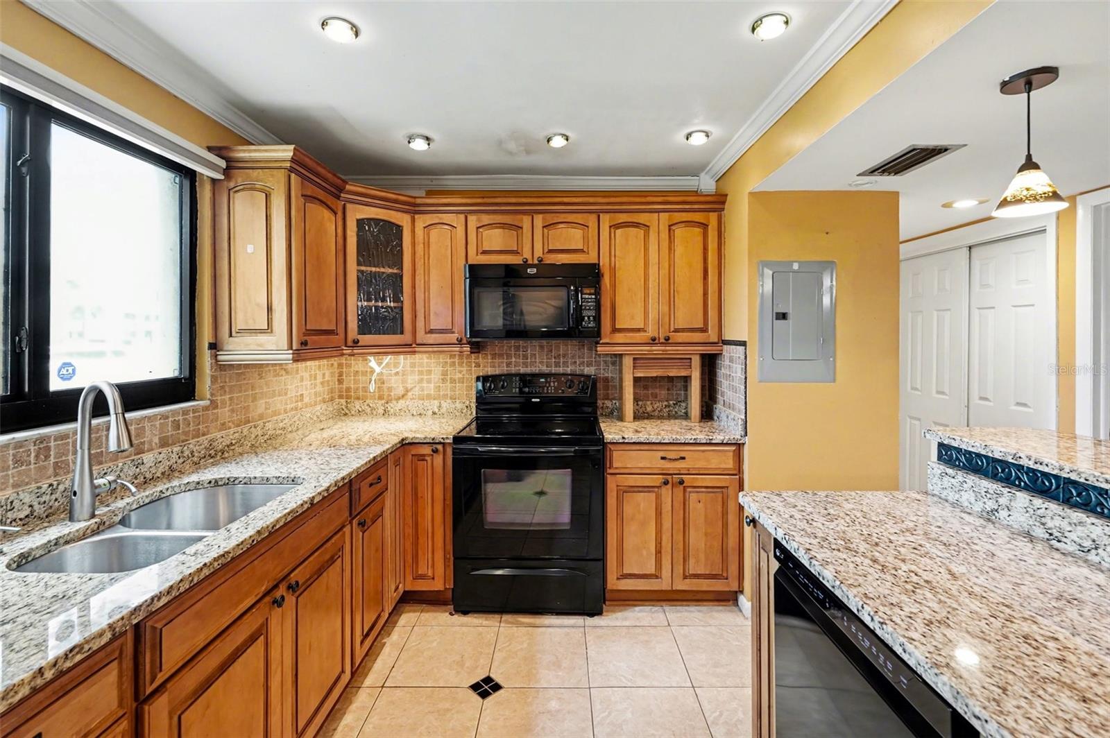 Kitchen (Newer Dishwasher, Impact resistant window with remote control blind, new granite)