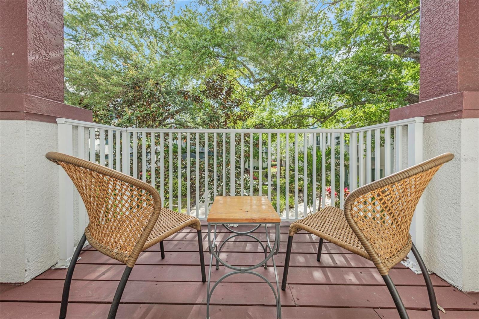 Enjoy a lanai view of the beautifully landscaped courtyard and fountain.