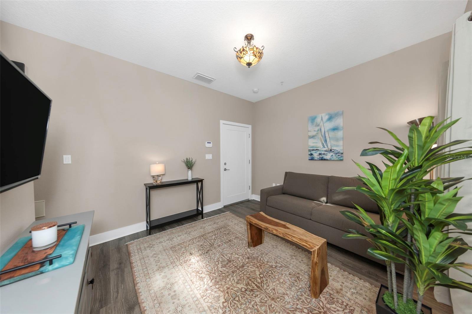 First-floor entry from the courtyard or the garage leads into your den or office.