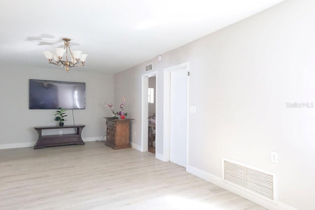 Great room (one of the doos on the right side is the entrance to bed. # 1 and the other door is to the garage)