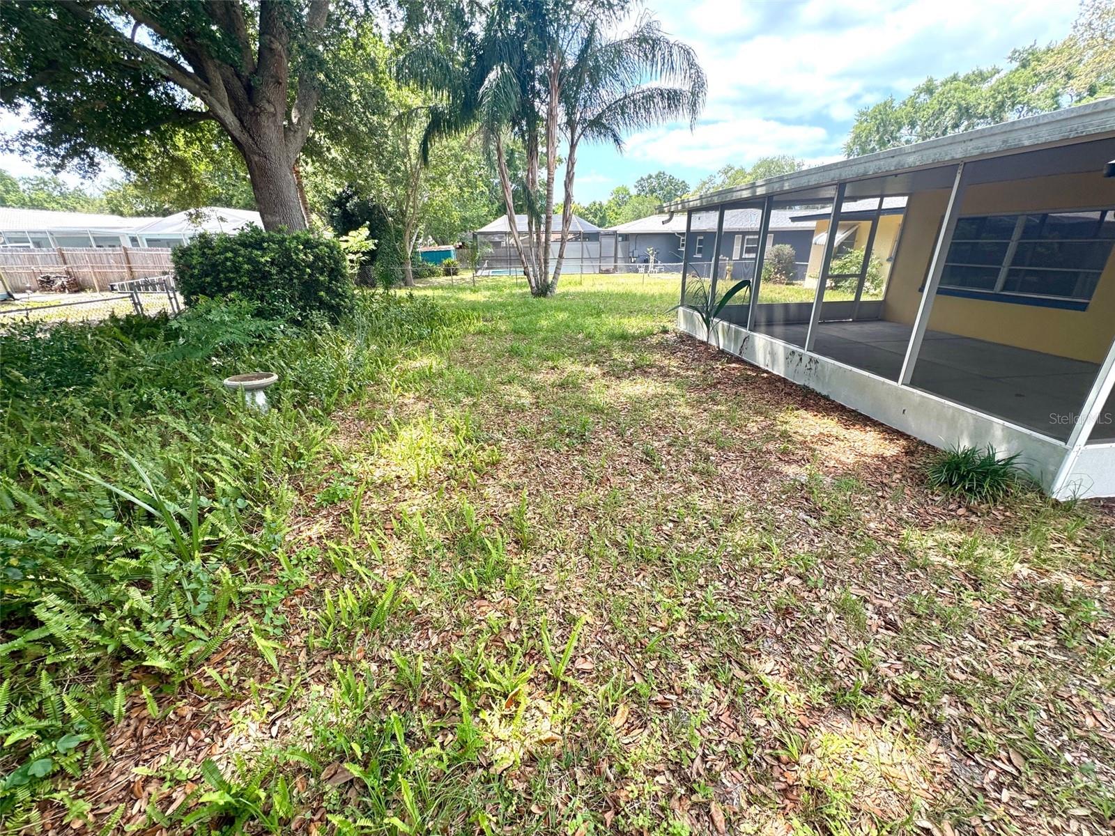 Extra deep back yard is fenced.