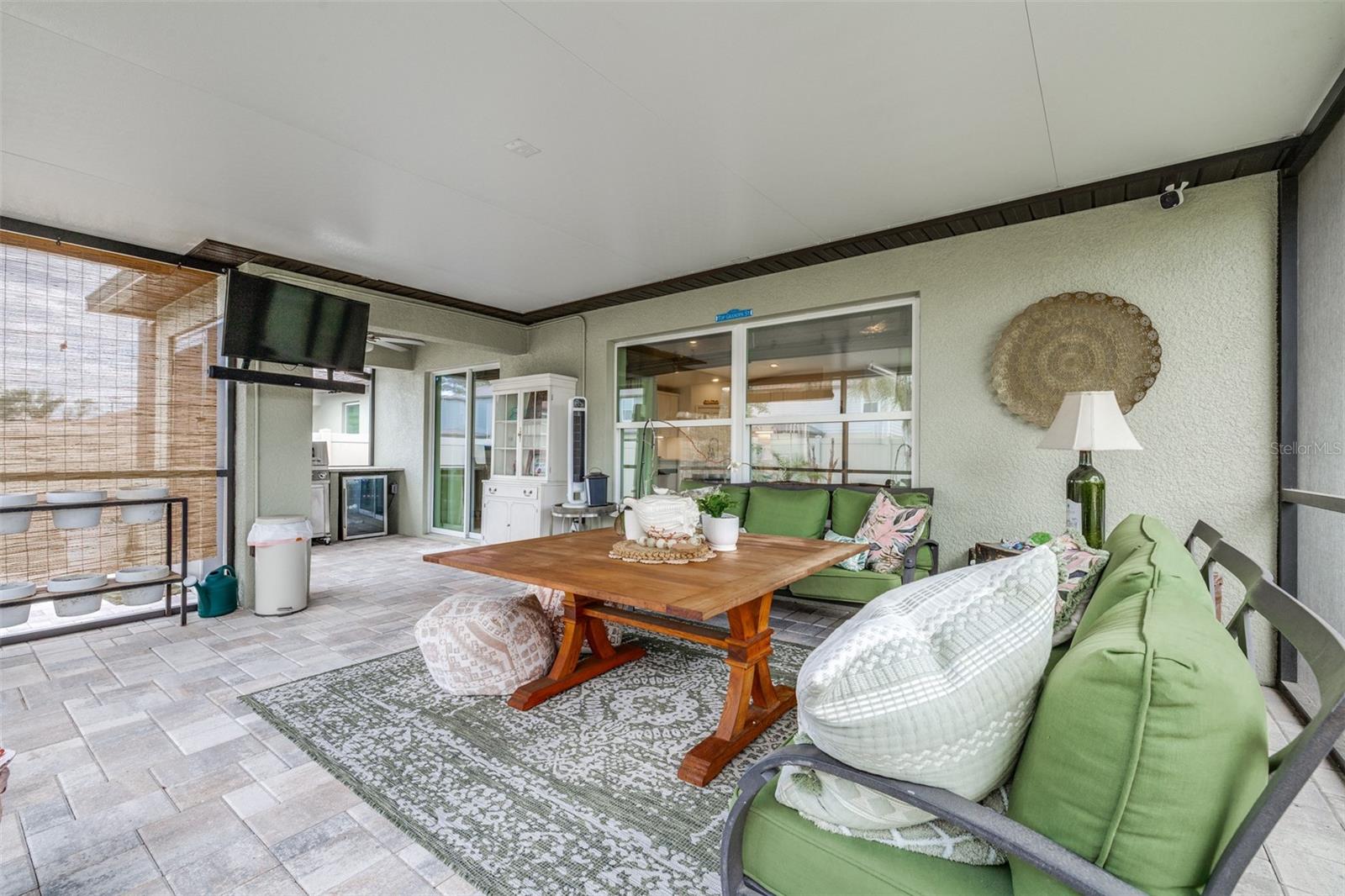 Covered, extended, screened paver lanai