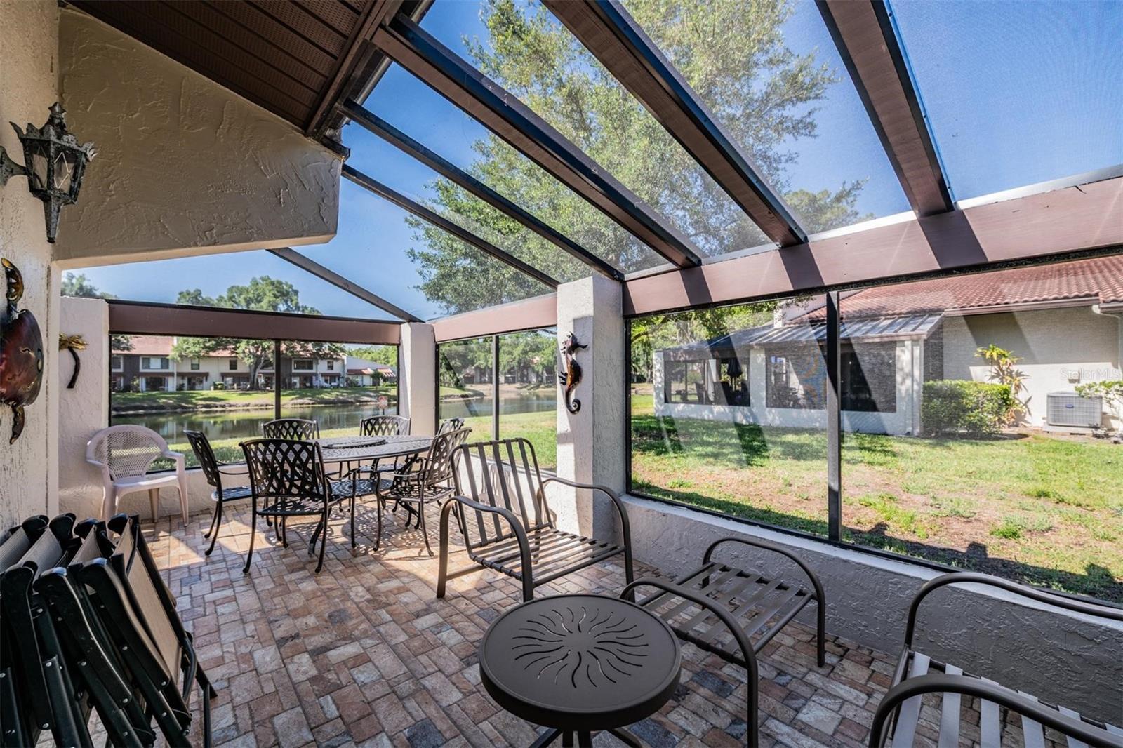 Screened patio with pavers