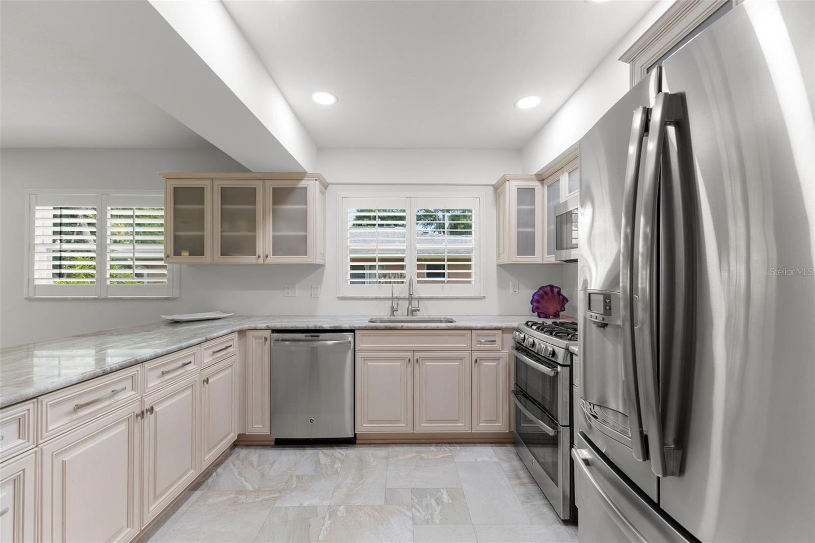 VIEW FROM LAUNDRY ROOM AND GARAGE TO THE RIGHT.