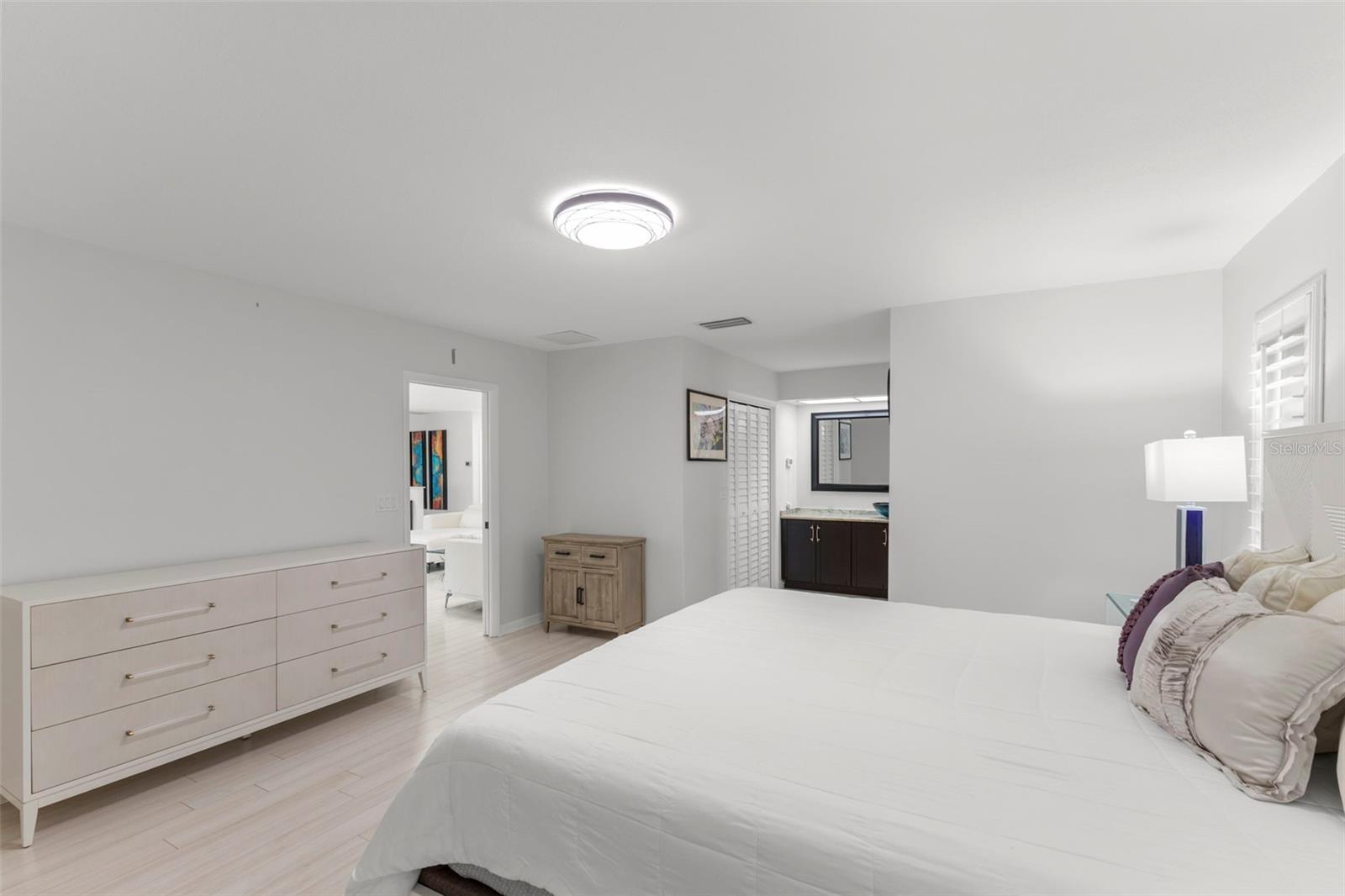 MASTER AND PRIMARY BEDROOM WITH WALK IN CLOSET AND EN-SUITE