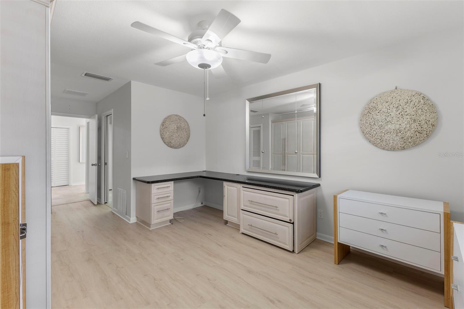 2ND BEDROOM WITH BATH AND BUILT IN DESK AND LOTS OF STORAGE