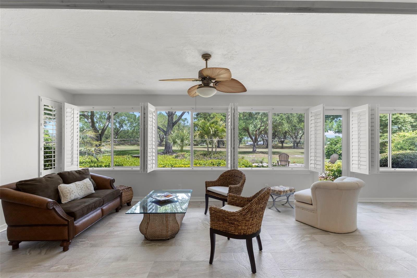 LOOK AT THAT VIEW FROM LIVING ROOM TO BACK PORCH