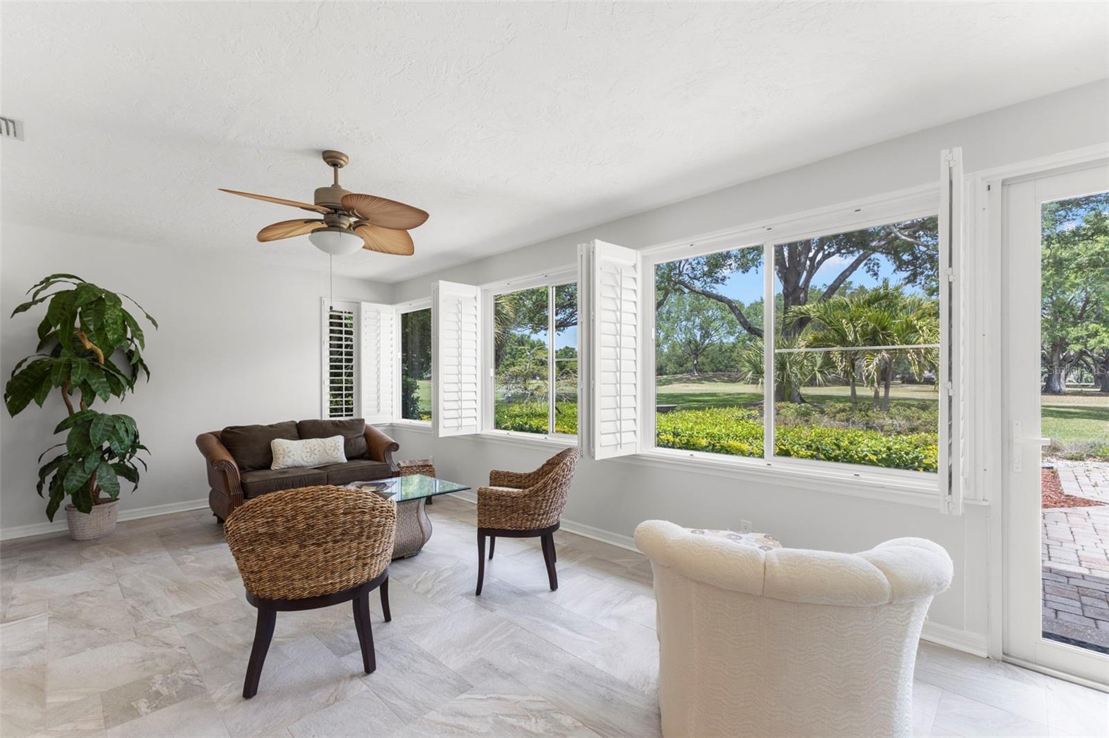 BEAUTIFUL CERAMIC FLOOR IN BACK PORCH WITH BACK DOOR