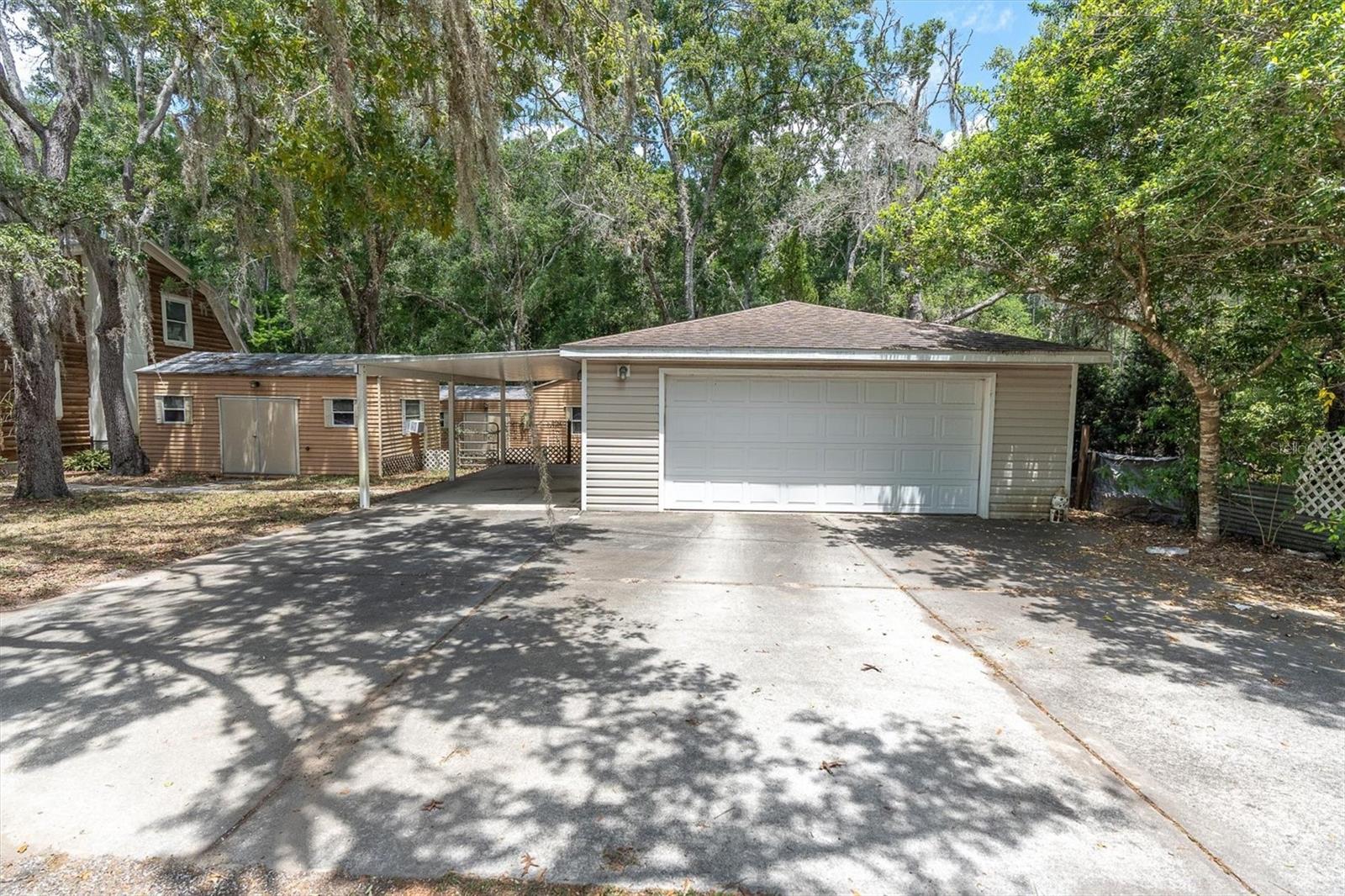 Detach 2 car garage and carport
