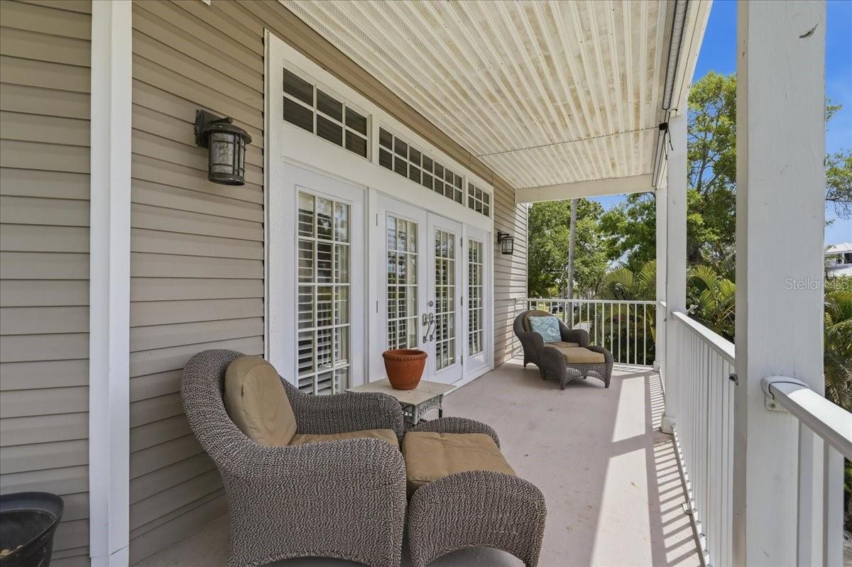ONE OF THREE COVERED BALCONIES