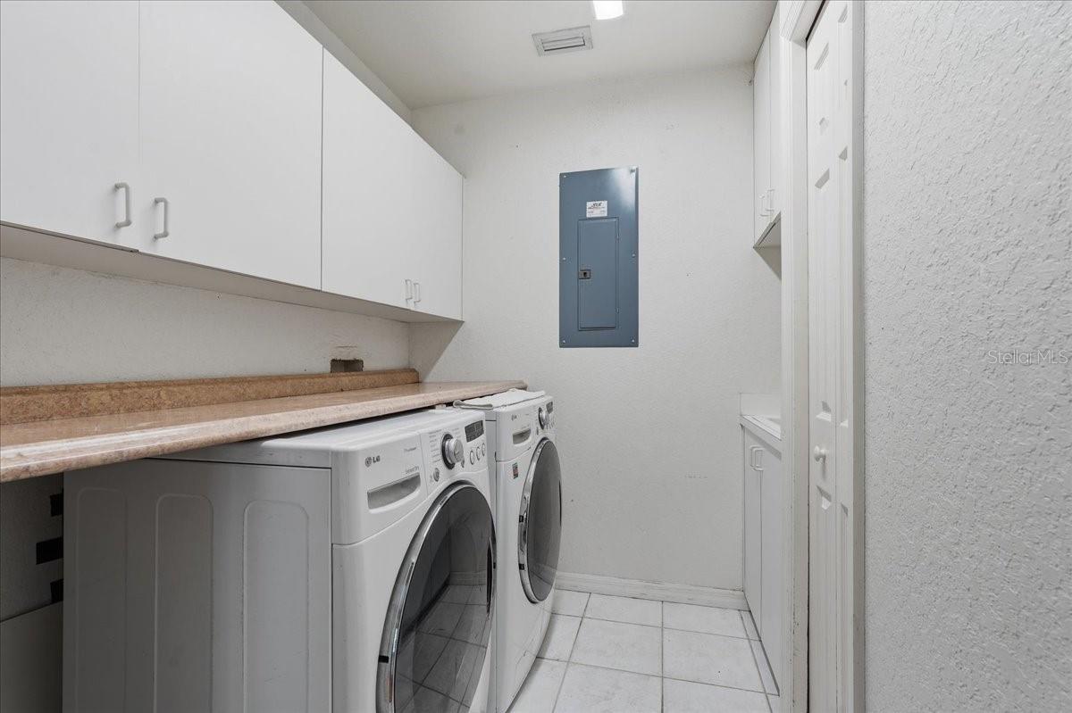 LAUNDRY ROOM WITH LAUNDRY CHUTE FROM UPSTAIRS BEDROOMS!