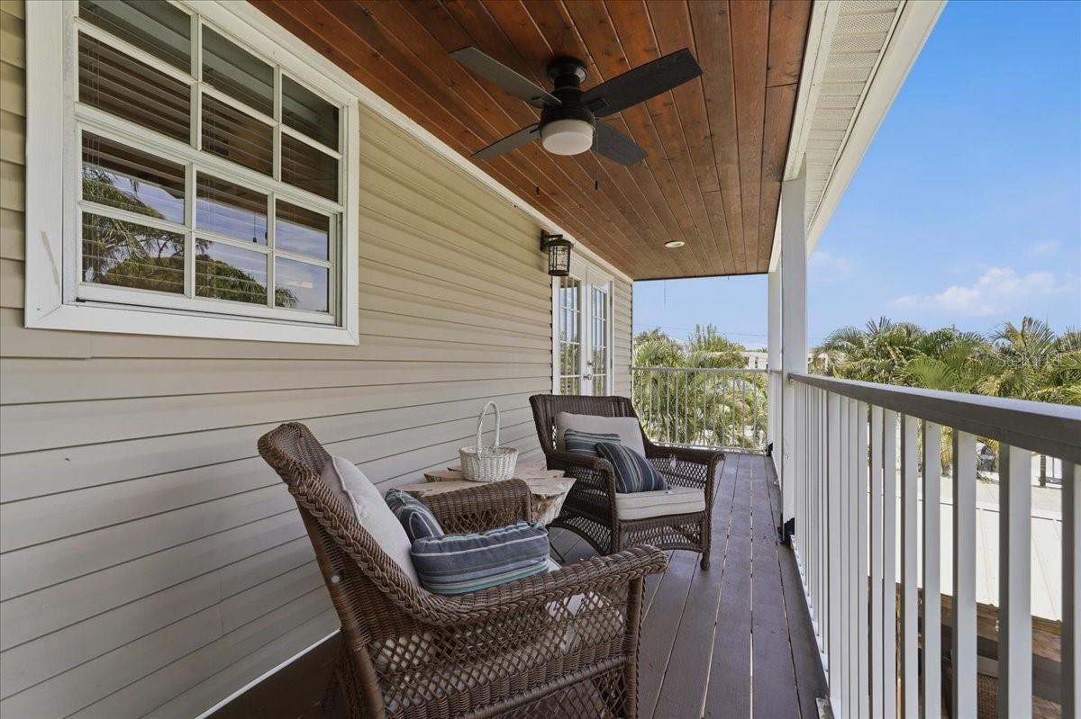 2ND STORY REAR BALCONY OFF THE KITCHEN, OVERLOOKING POOL AREA