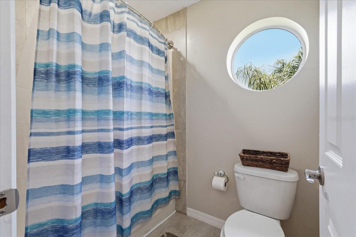 SHOWER/TUB COMBO IN THE GUEST BATHROOM
