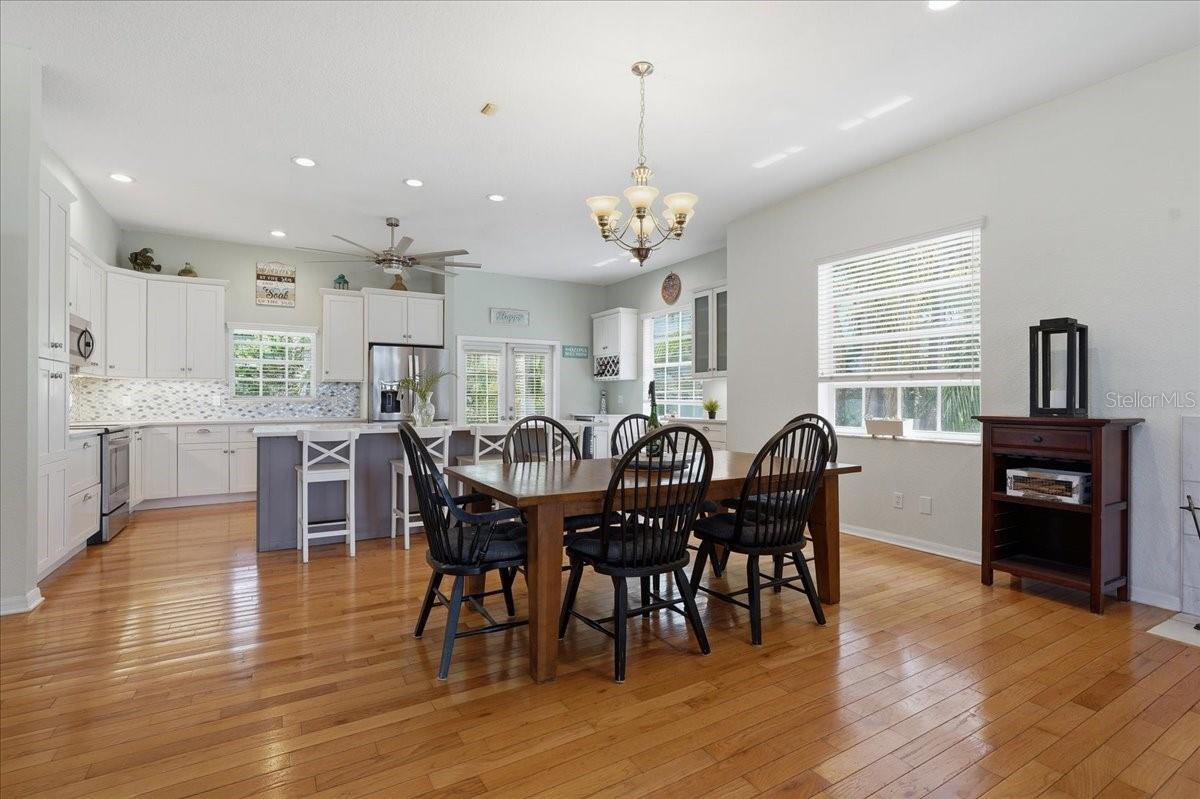 OPEN FLOOR PLAN WITH BEAUTIFUL HARDWOOD FLOORING