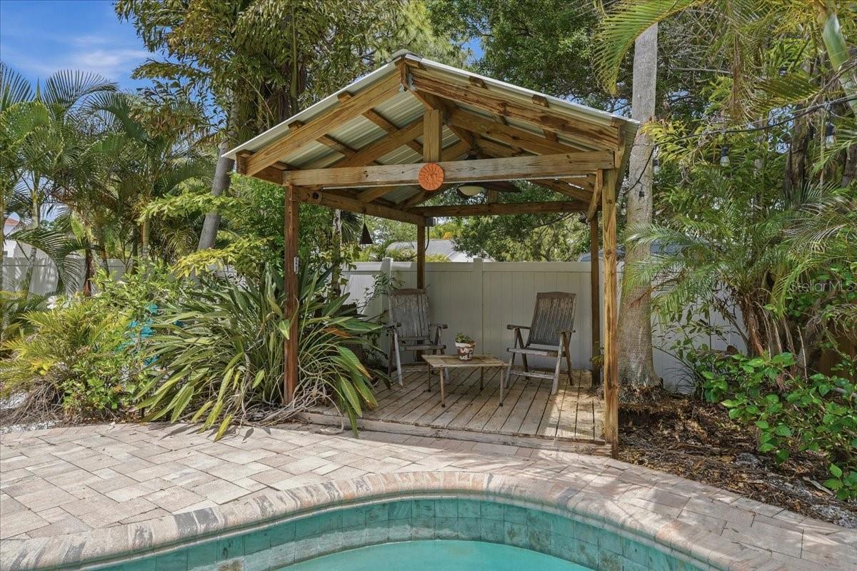 ONE OF TWO COVERED CABANAS OUTSIDE!