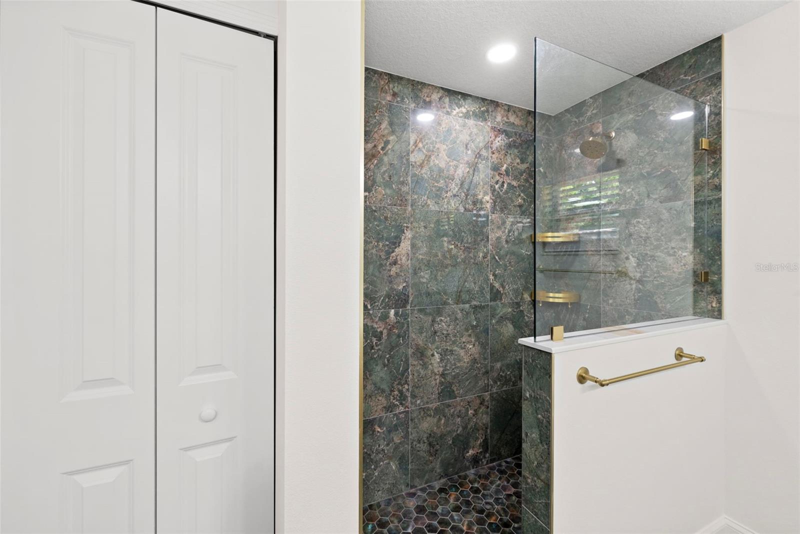 Primary Ensuite Bathroom Shower & Linen Closet