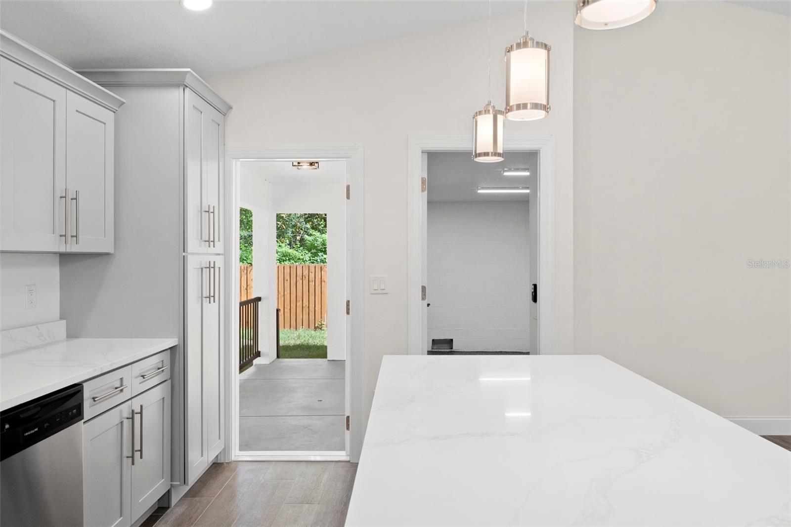 Kitchen: Left Door to Rear Porch, Right Door to Garage