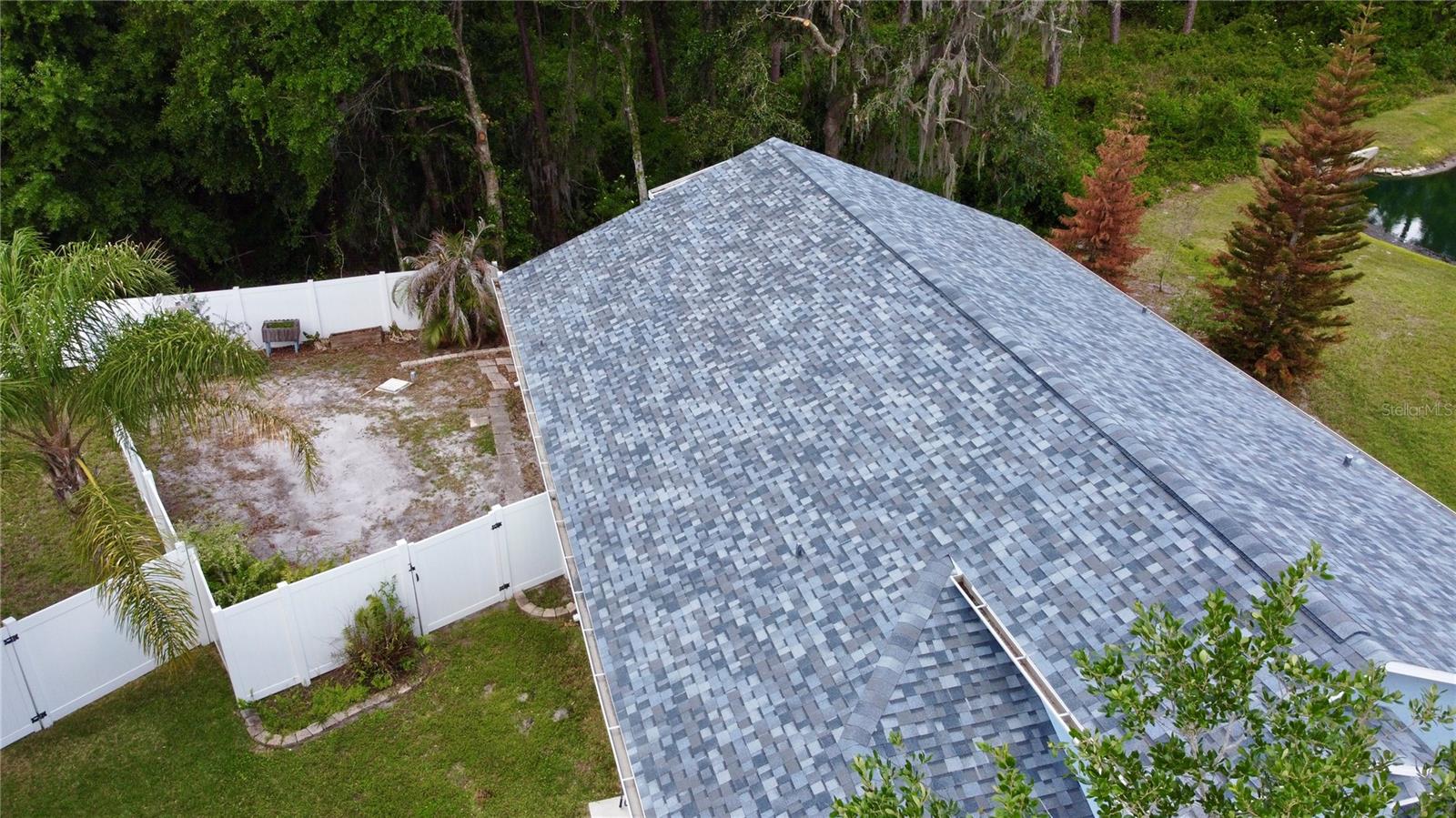 fenced backyard garden