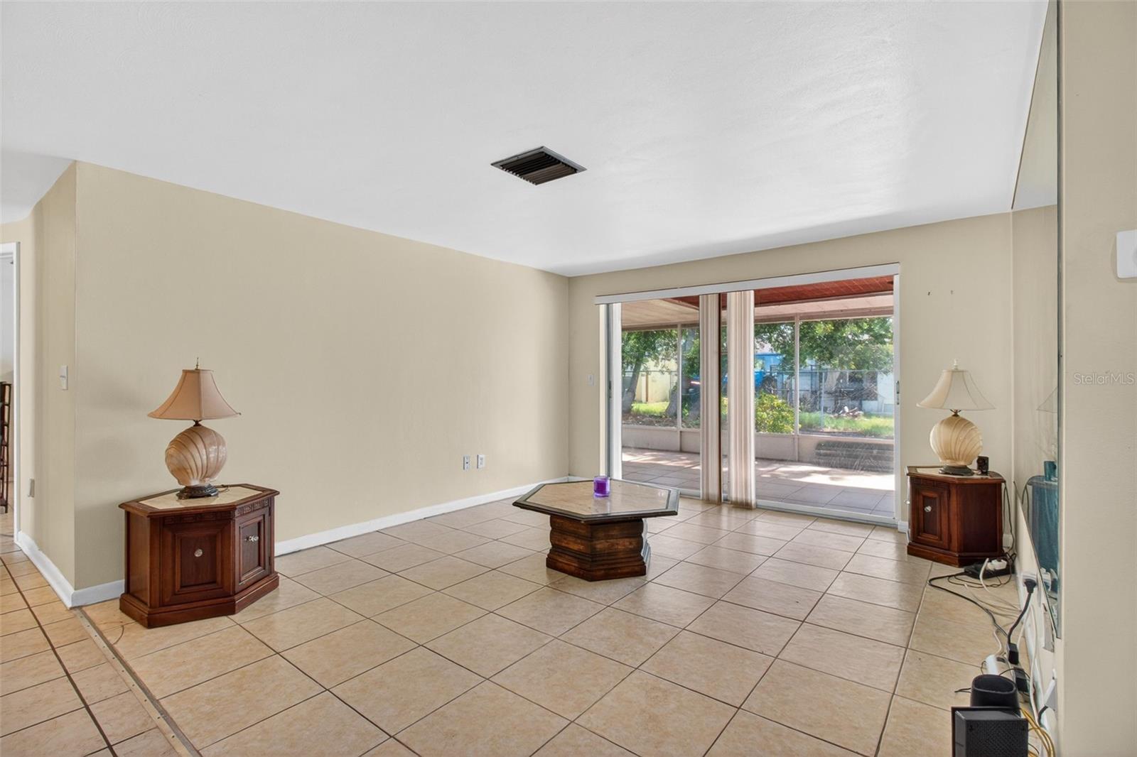Living Room with view of Patio
