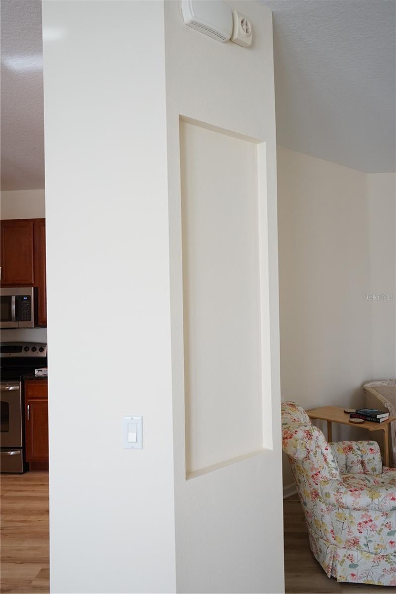 niche for artwork by kitchen