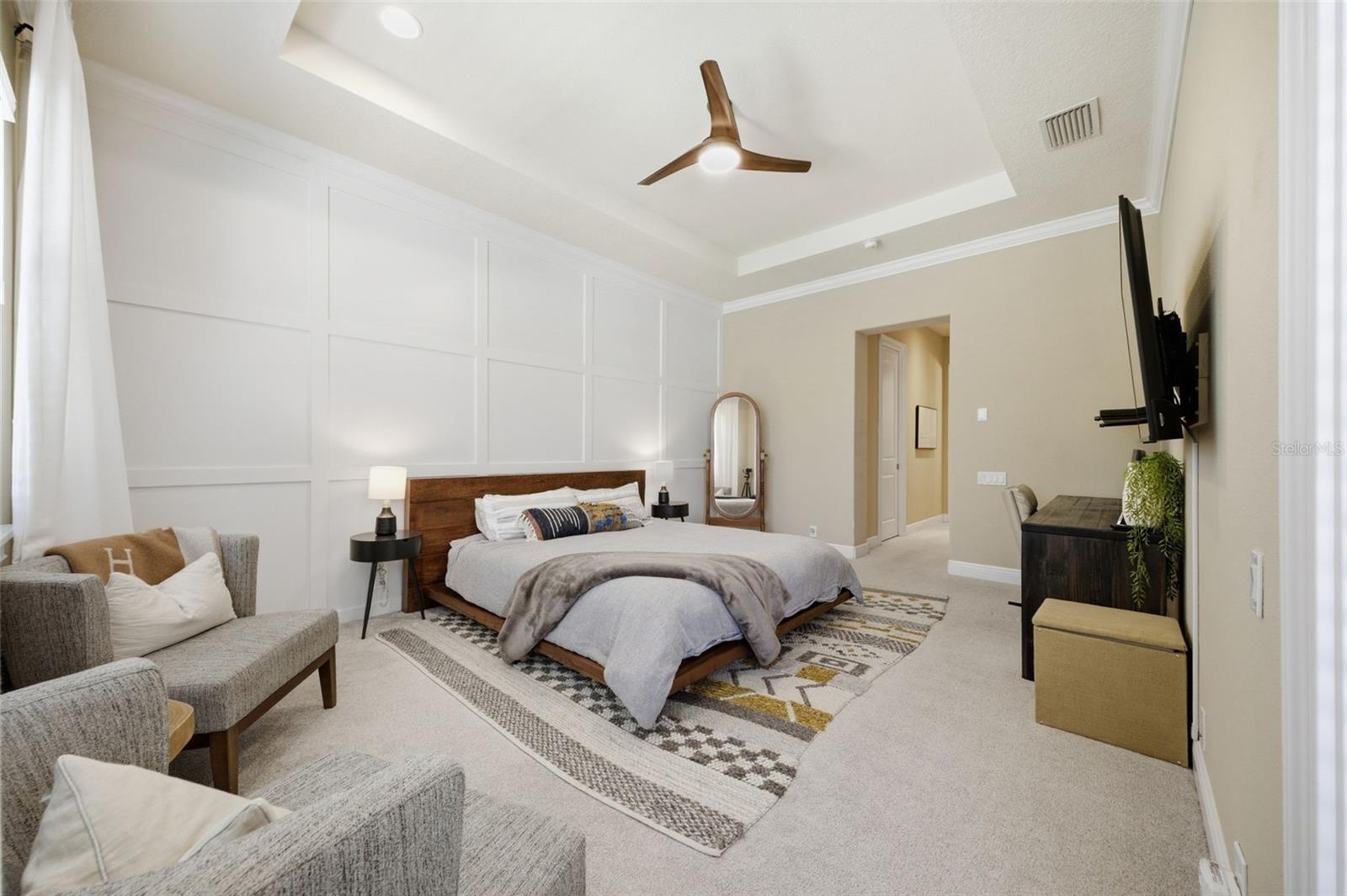 Main floor primary suite with two large walk in closets.