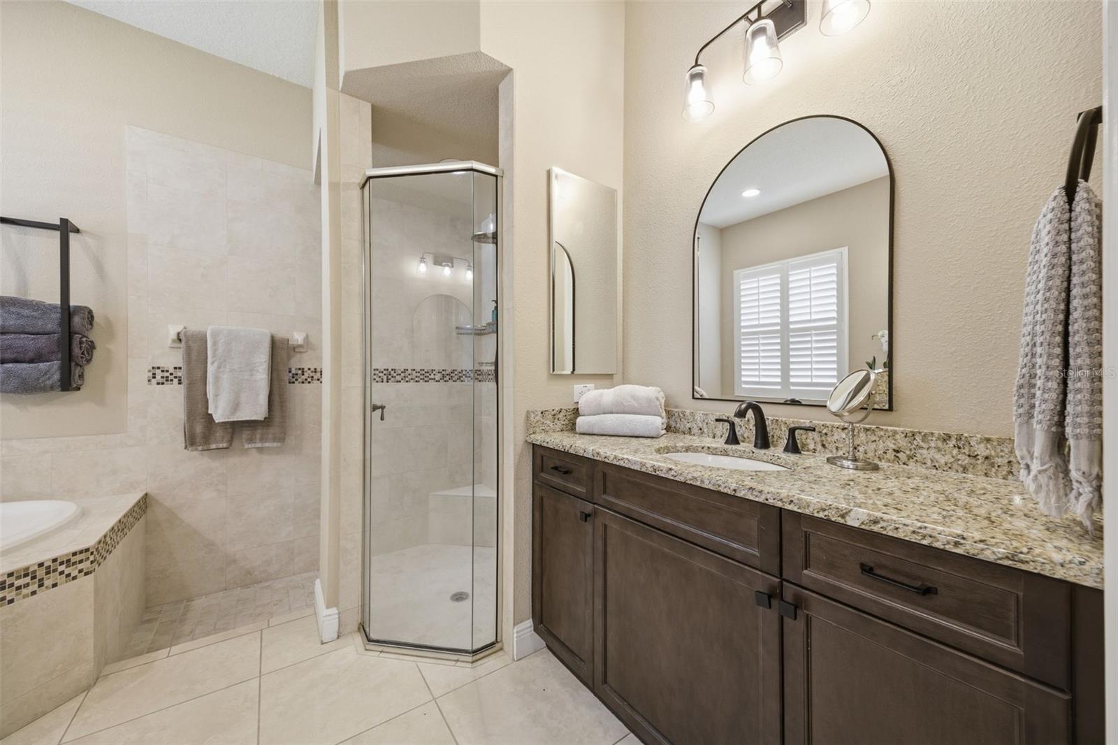 Main floor primary  ensuite bath with private water closet.